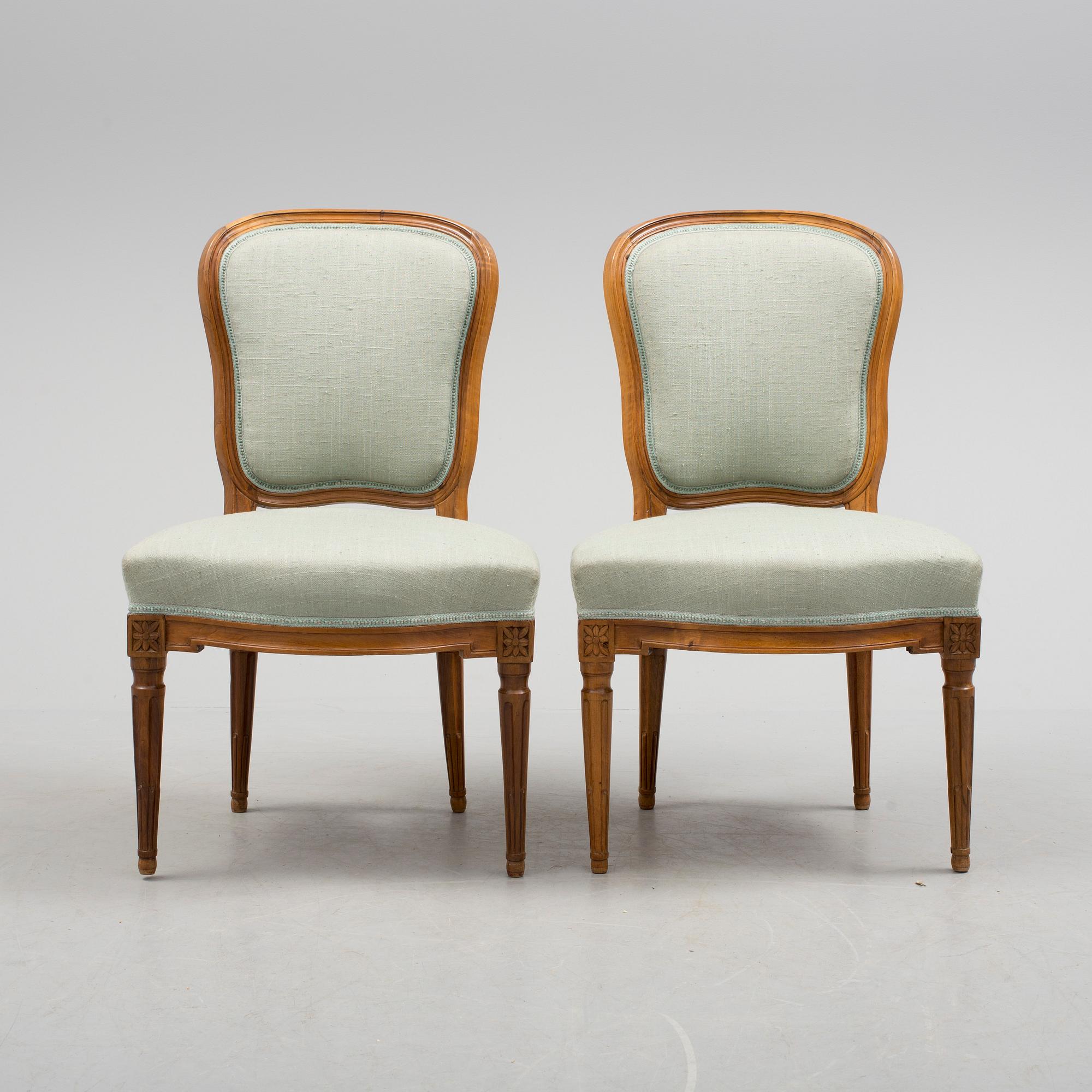 A pair of chairs, circa 1800.