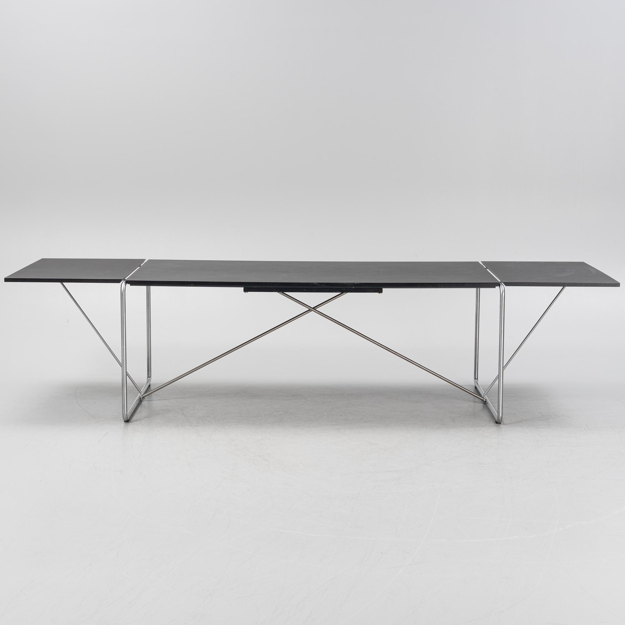 Niels Jørgen Haugesen, a model 4750 dining table, Fredericia, Denmark.