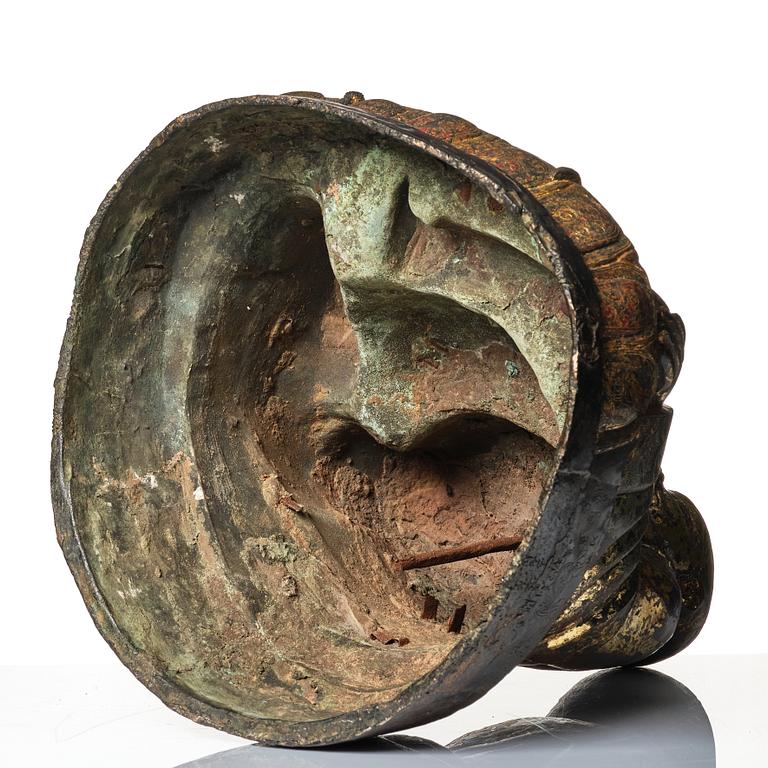 A large seated bronze figure of Budai, Ming Dynasty, dated to the fifth year of Jiajing (1526).
