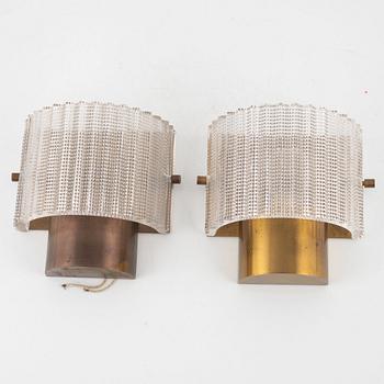 Carl Fagerlund, a pair of wall lamps, Orrefors, mid-20th century.