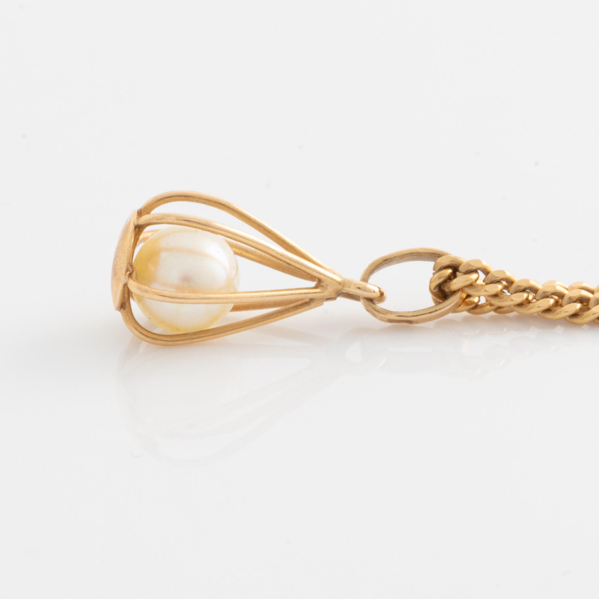 Hängsmycke, guld med pärla.