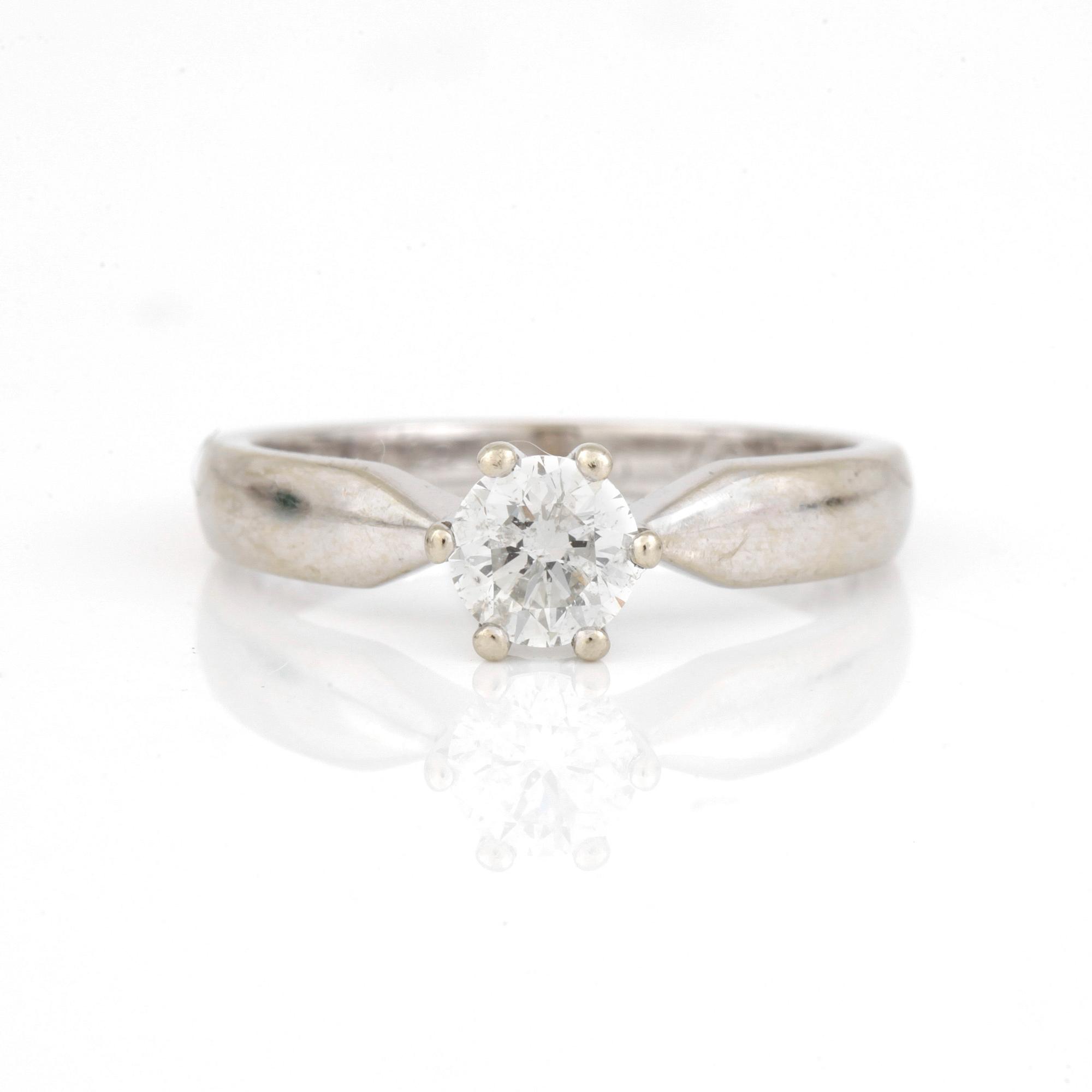 RING, Stjärnringen, modell Bellatrix, med briljantslipad diamant 0.80 ct enligt gravyr.