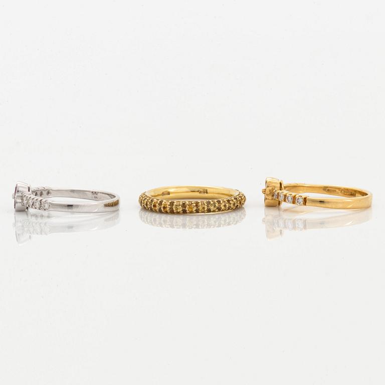 Yellow and pink sapphire and brilliant-cut diamond three rings.