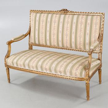 A Louis XVI style sofa from the first half of the 20th century.