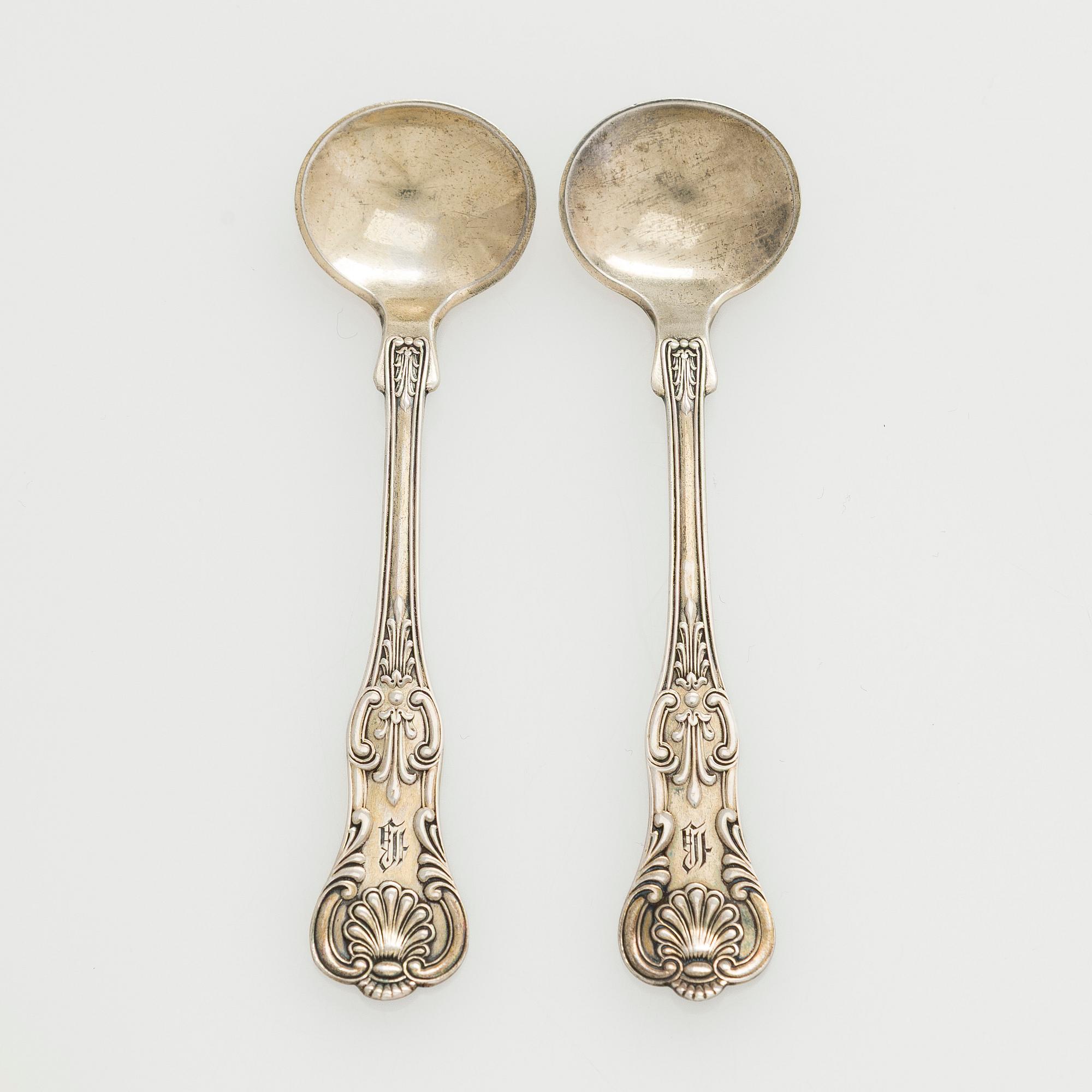 Black Starr & Frost, a pair of sterling silver shakers and sugar bowls, USA around 1900, Gorham pair of sterling spoons.