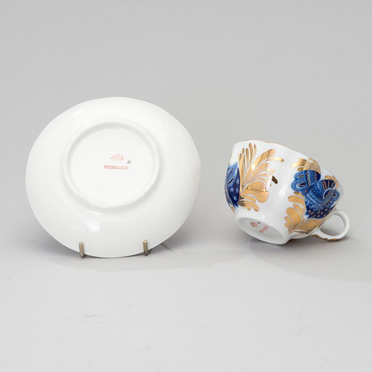 A 34-piece'Golden Garden' porcelain tea- and coffee set from Lomonosov, Soviet Union.