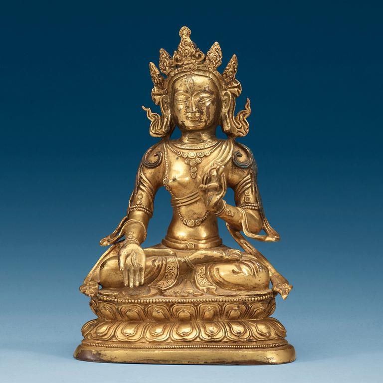 A Sinotibetan gilt bronze figure of Tara, Qing dynasty.