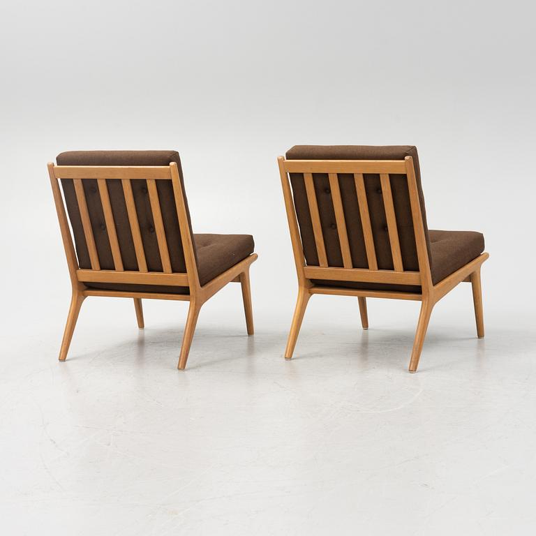 Karl Erik Ekselius, probably. A pair of oak easy chairs, JOC, Vetlanda, 1960's.