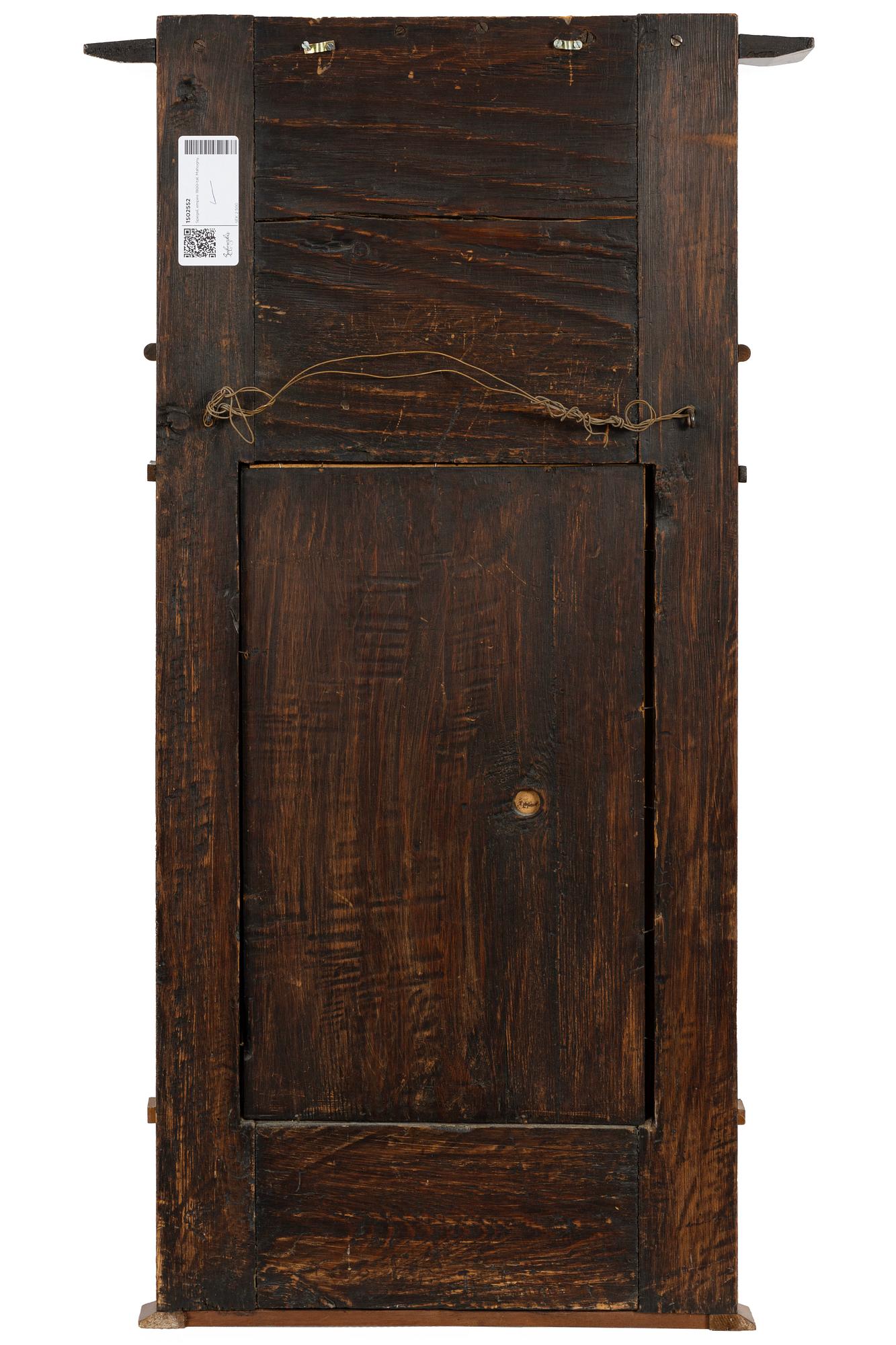 An Empire mahogany mirror, 19th Century.