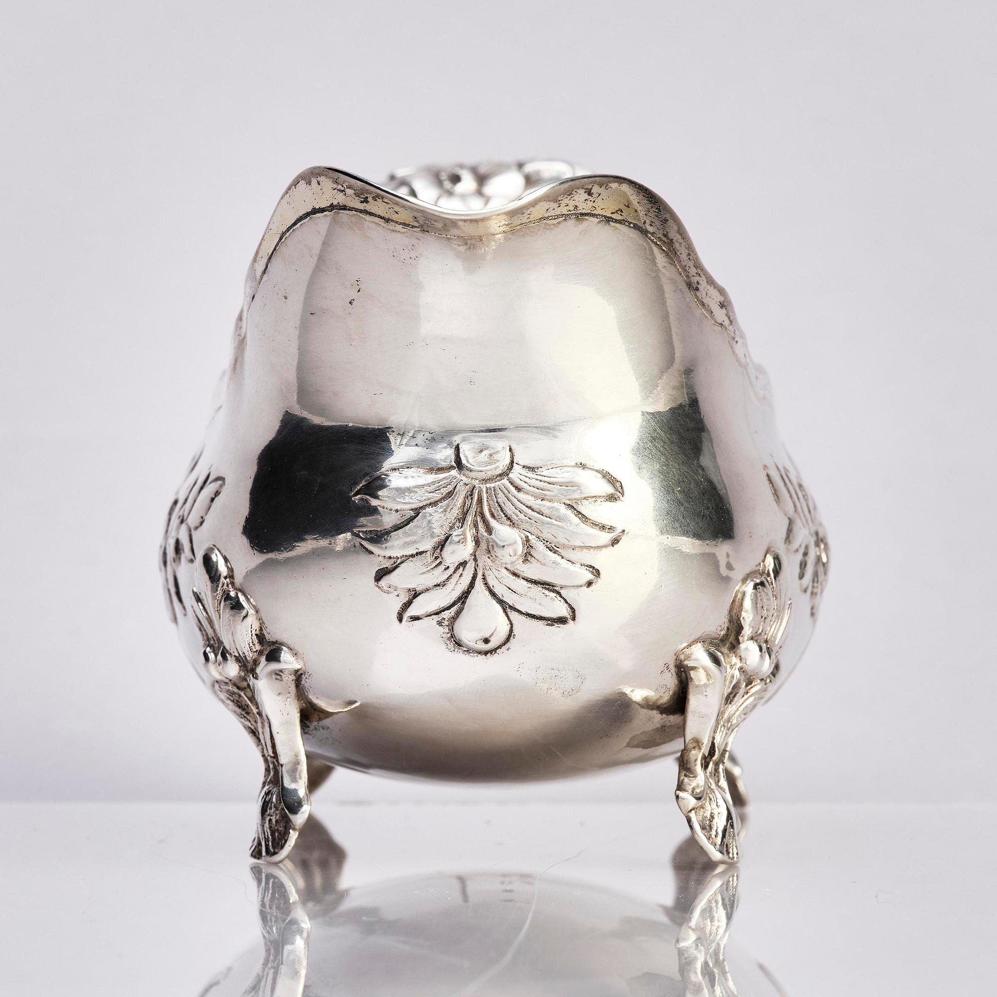 A Swedish mid- 18th century parcel-gilt silver cream-jug, mark of Anders Schotte, Uddevalla 1779.