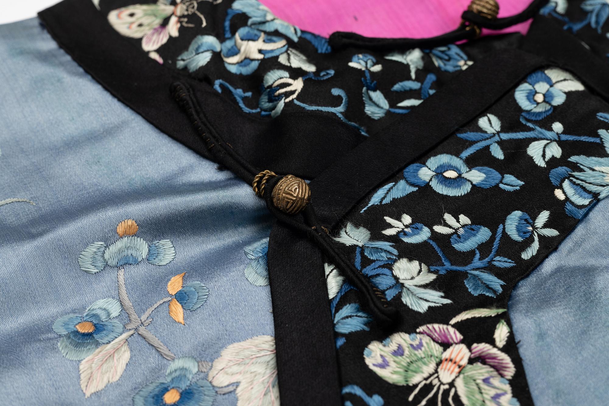 A lavender blue embroidered silk female informal robe, late Qing dynasty, 19th century.