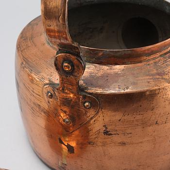 A coffee pot and a ladle in copper from the 19th century.