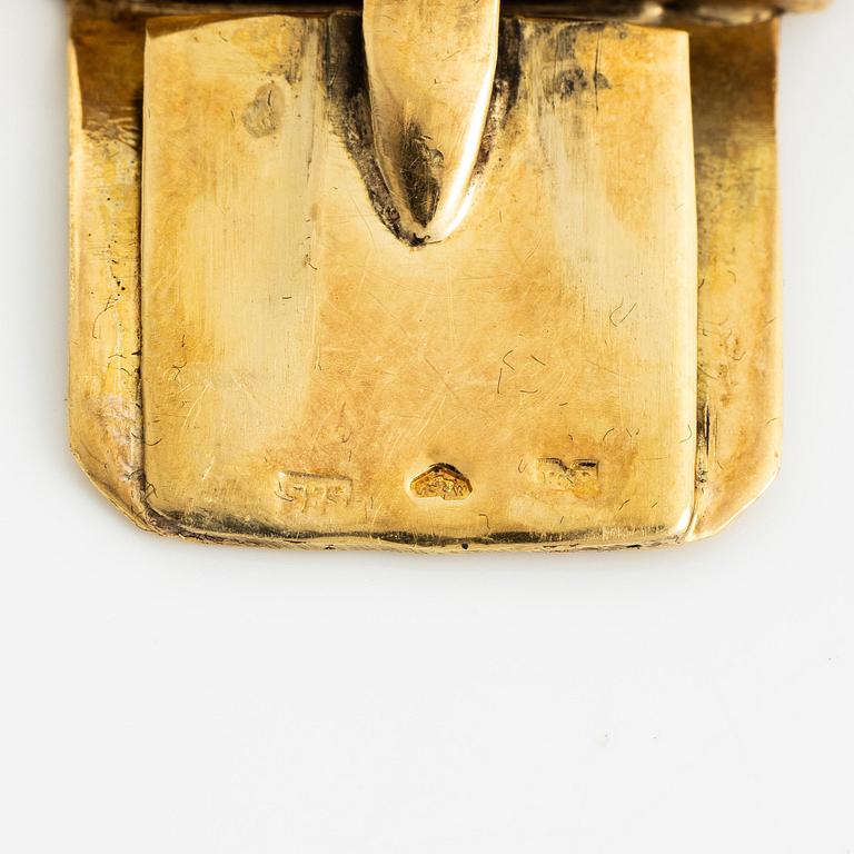A bracelet 14K gold in two colours.