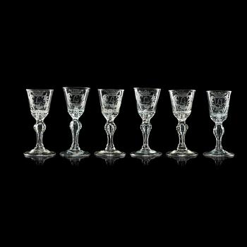679. A set of six cut and engraved glasses, 18th Century.