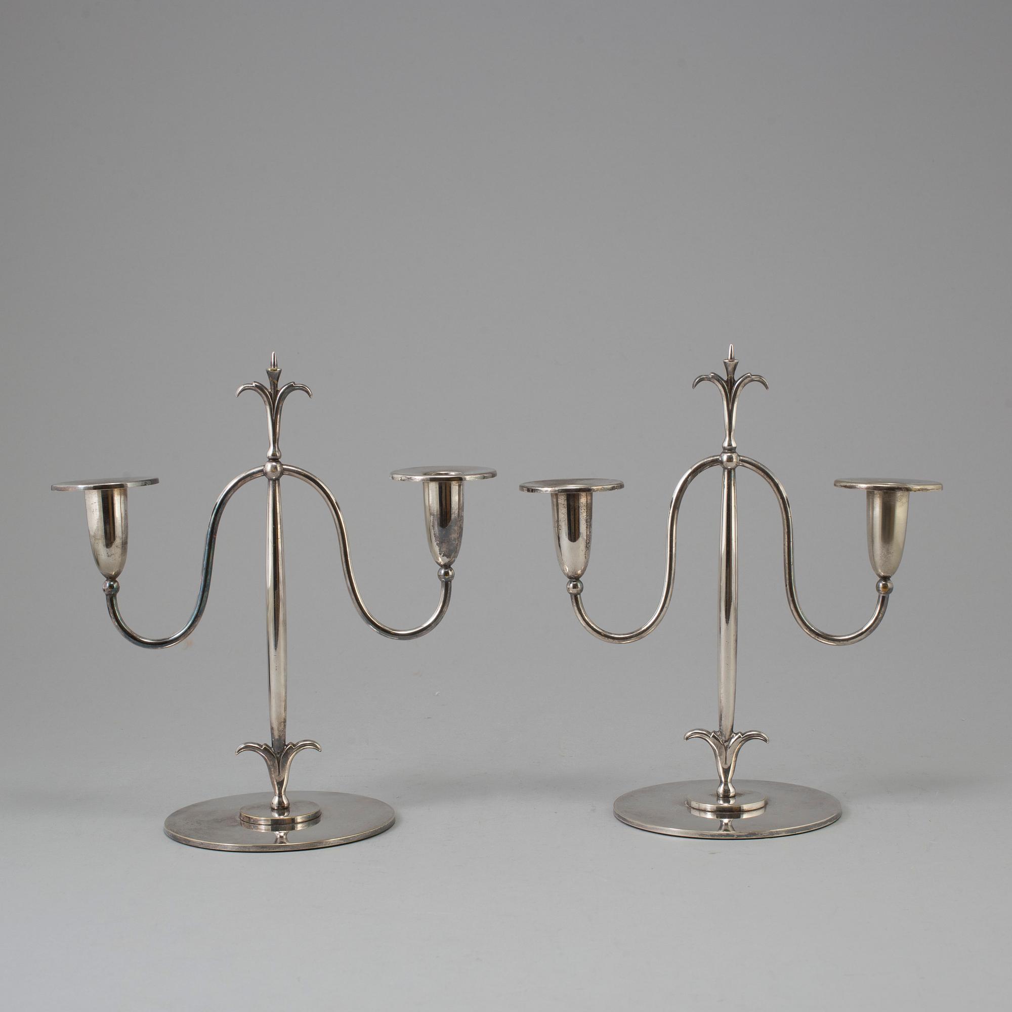 a pair of Elis Bergh silver plated candelabras, Swedish grace, CG Hallberg, Stockholm, 1920s.