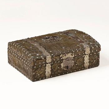 A presumably German baroque repoussé brass writing box, late 17th century.