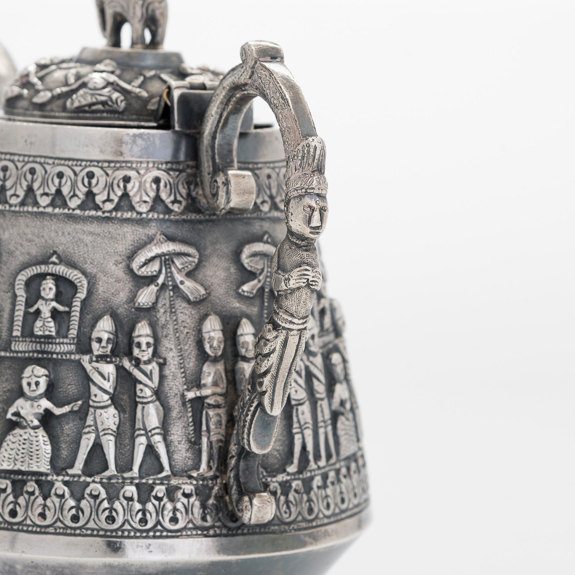 An Indian silver teapot.