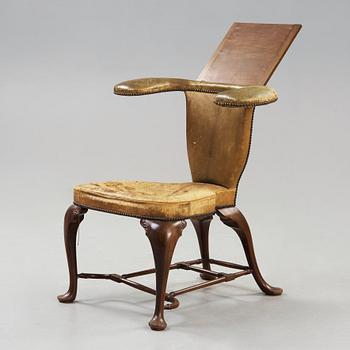 An English 18th century reading and writing chair.