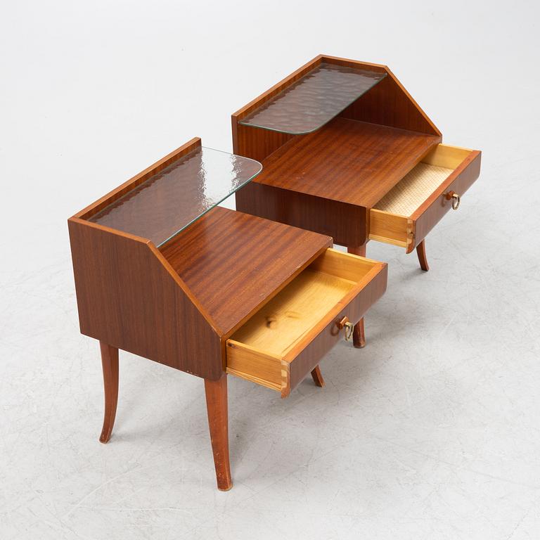 A pair of Swedish Modern mahogany veneered bedside tables, 1940's.