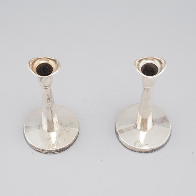 A pair of silver candle sticks by Tore Eld in gothenburg, Sweden, 1959.