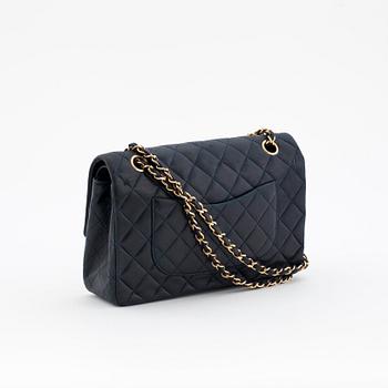 CHANEL, a quilted blue leather "Double Flap" shoulder bag.