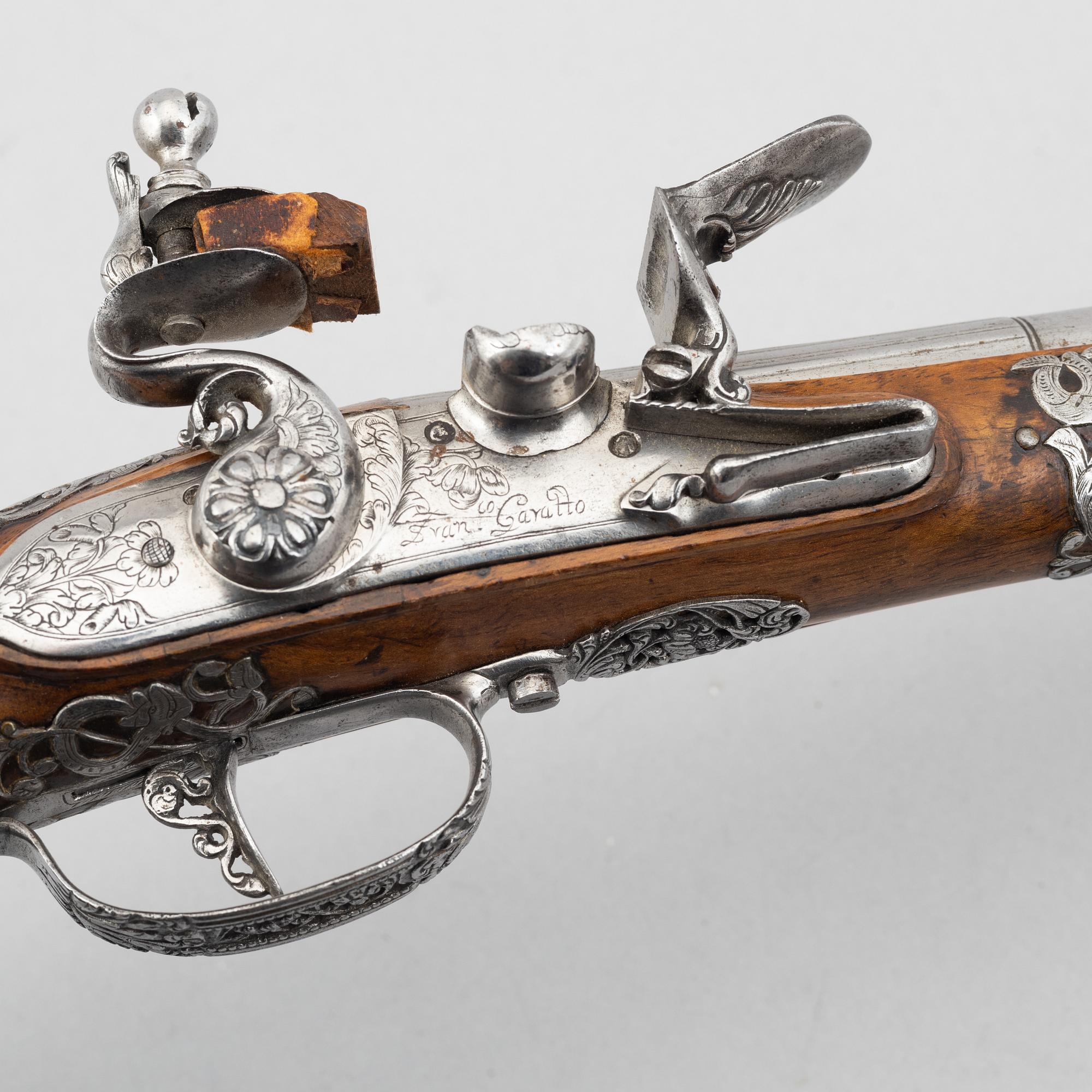 Flintlock pistol, signed Ivan Garatto. Brescia 17th century.