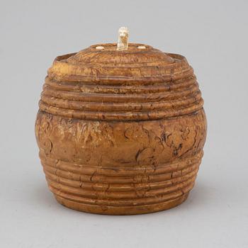 A 19th century birch tobacco box.
