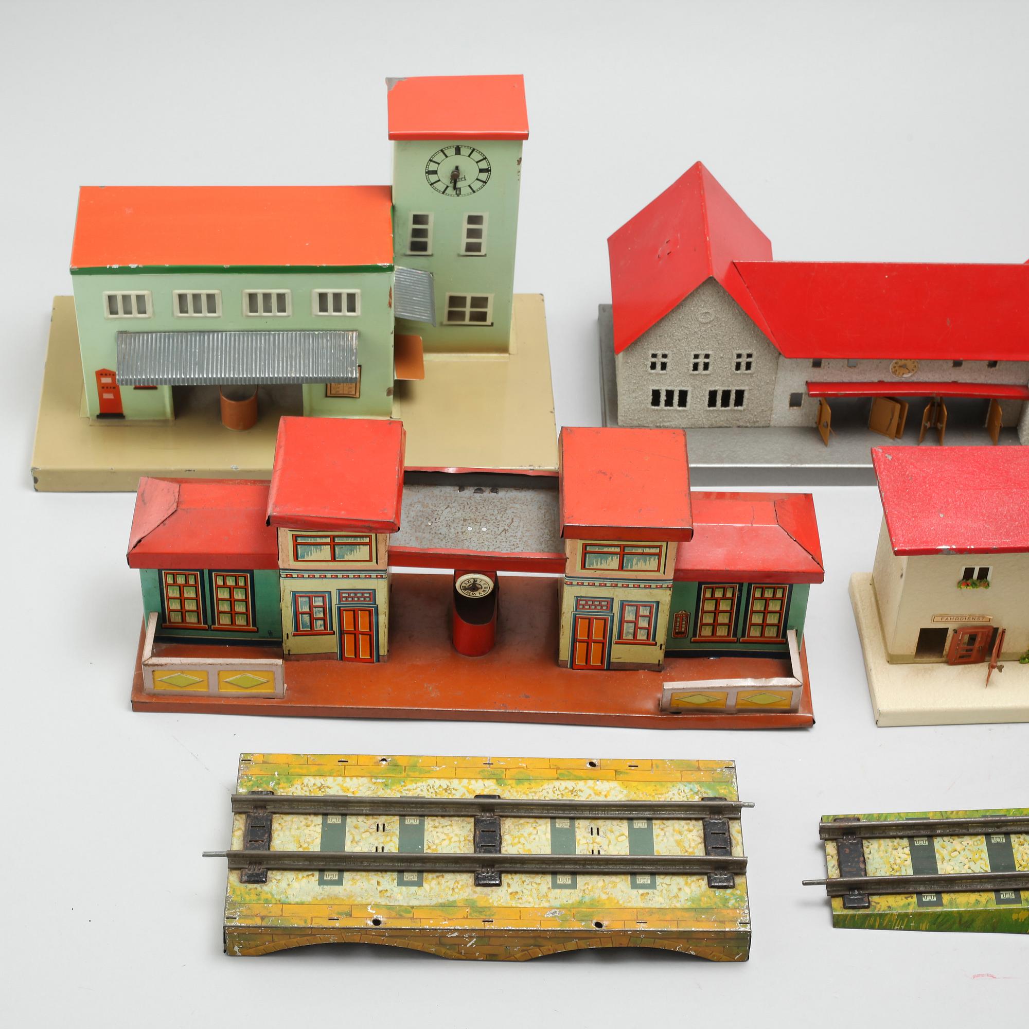Eight 20th century train model accessories, Germany and England.