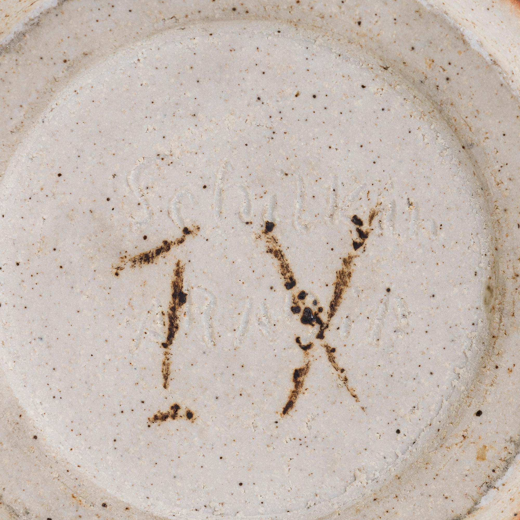 Michael Schilkin, a stoneware bowl, signed Schilkin Arabia.