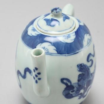 A 20th century porcelain tea pot.