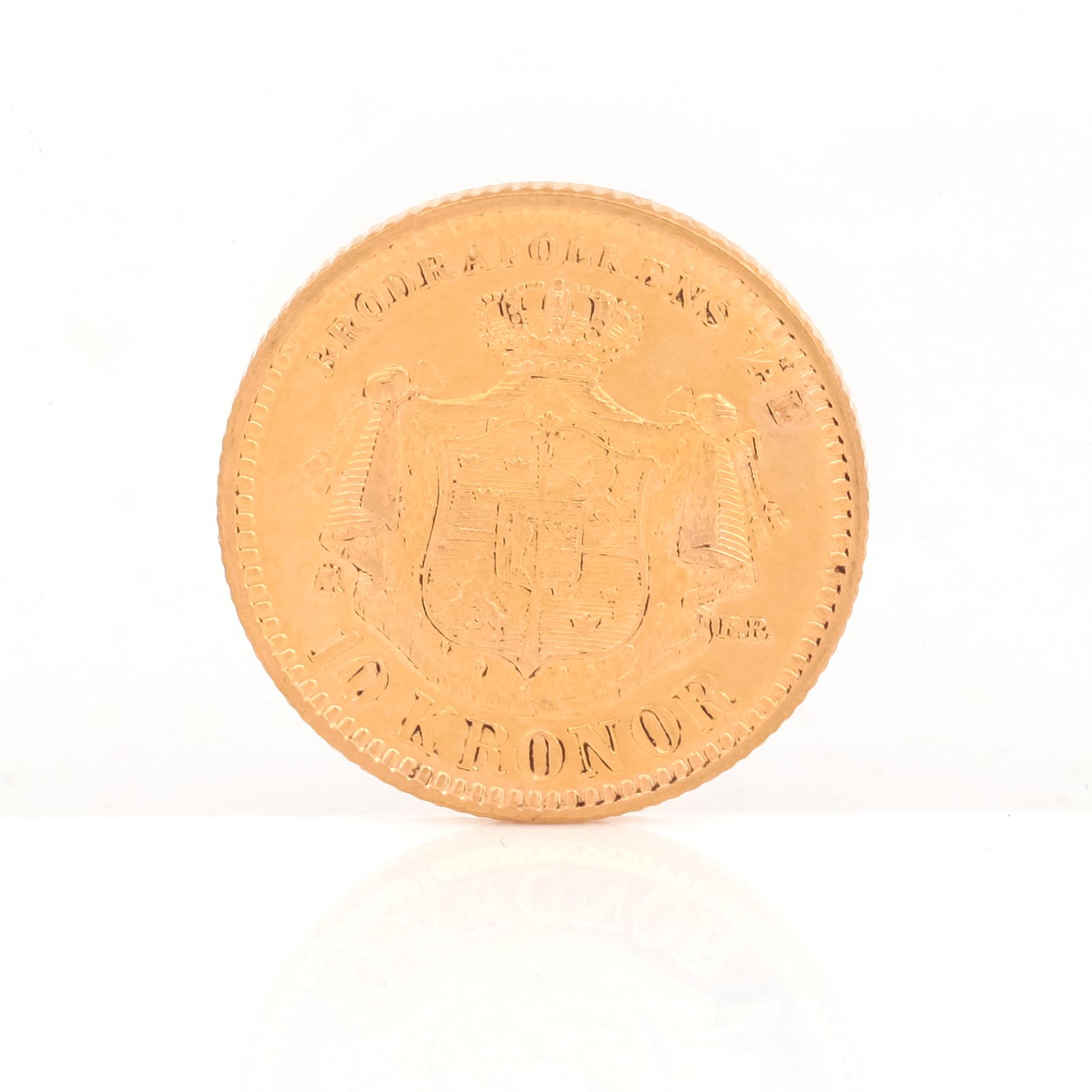 GULDMYNT, 10 kronor, Oscar II av Sverige och Norge 1883. Vikt ca 4,5 gram.