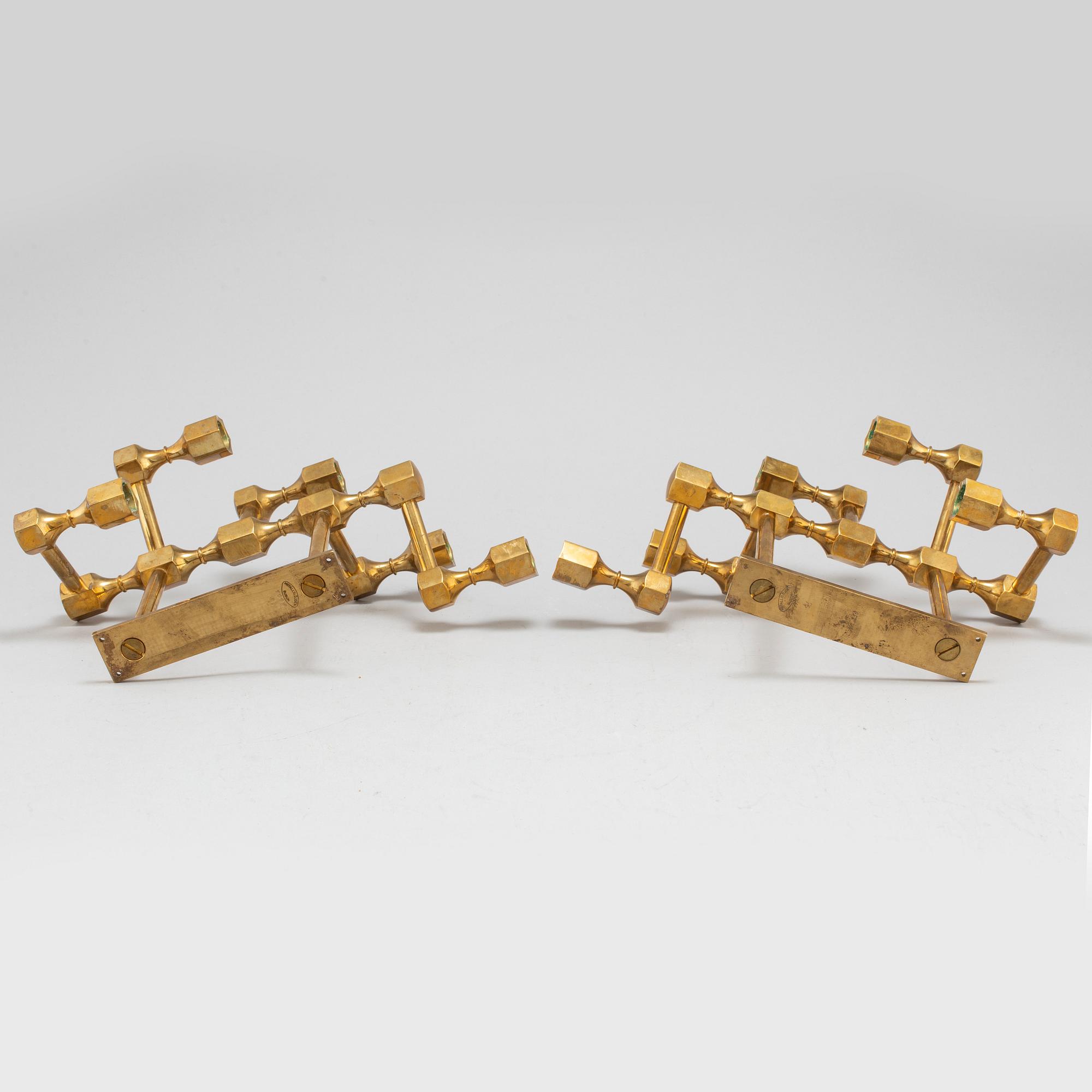 A pair of brass wall candelabras, for Gusum, signed BK and dated 1995 and 1997.