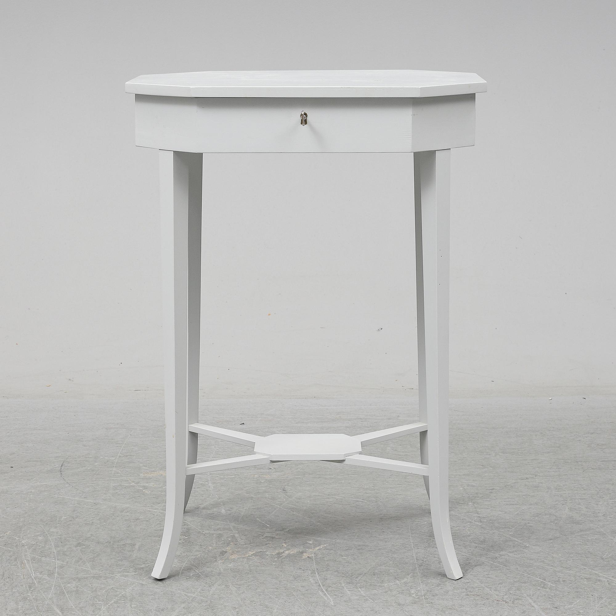 A ladys working table 20 th century.