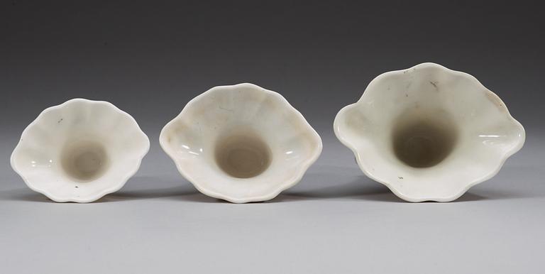 A set of three blanc de chine rhinoserous cups, Qing dynasty.