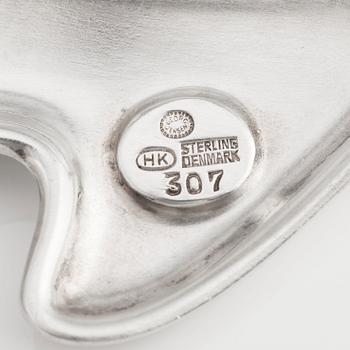 Henning Koppel, a sterling silver and dark brown enamel brooch, Georg Jensen, Copenhagen, Denmark, model 307.