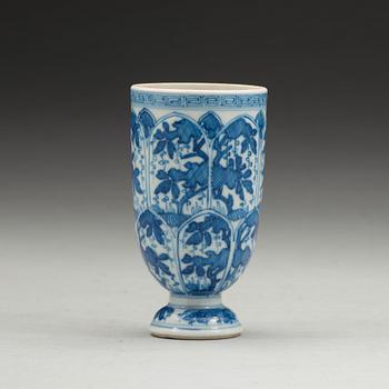 A blue and white cup with stand and a goblet, Qing dynasty, Kangxi (1662-1722).