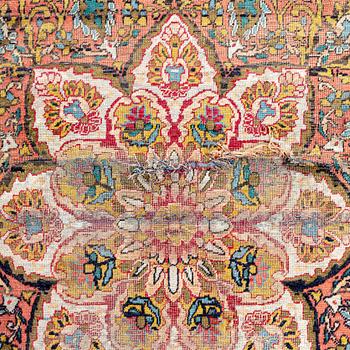 An antique Turkish /Hereke) signed carpet ca 200x121 cm.