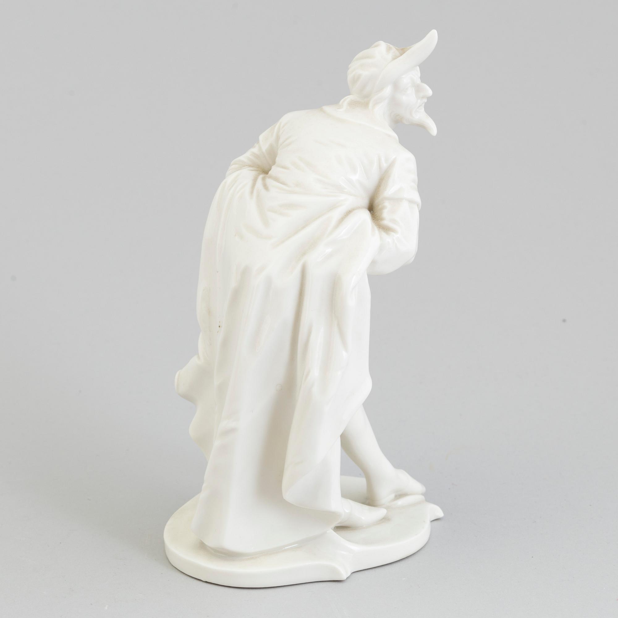 A white glazed figure of pantalone, Nymphenburg, Germany, 20th Century.