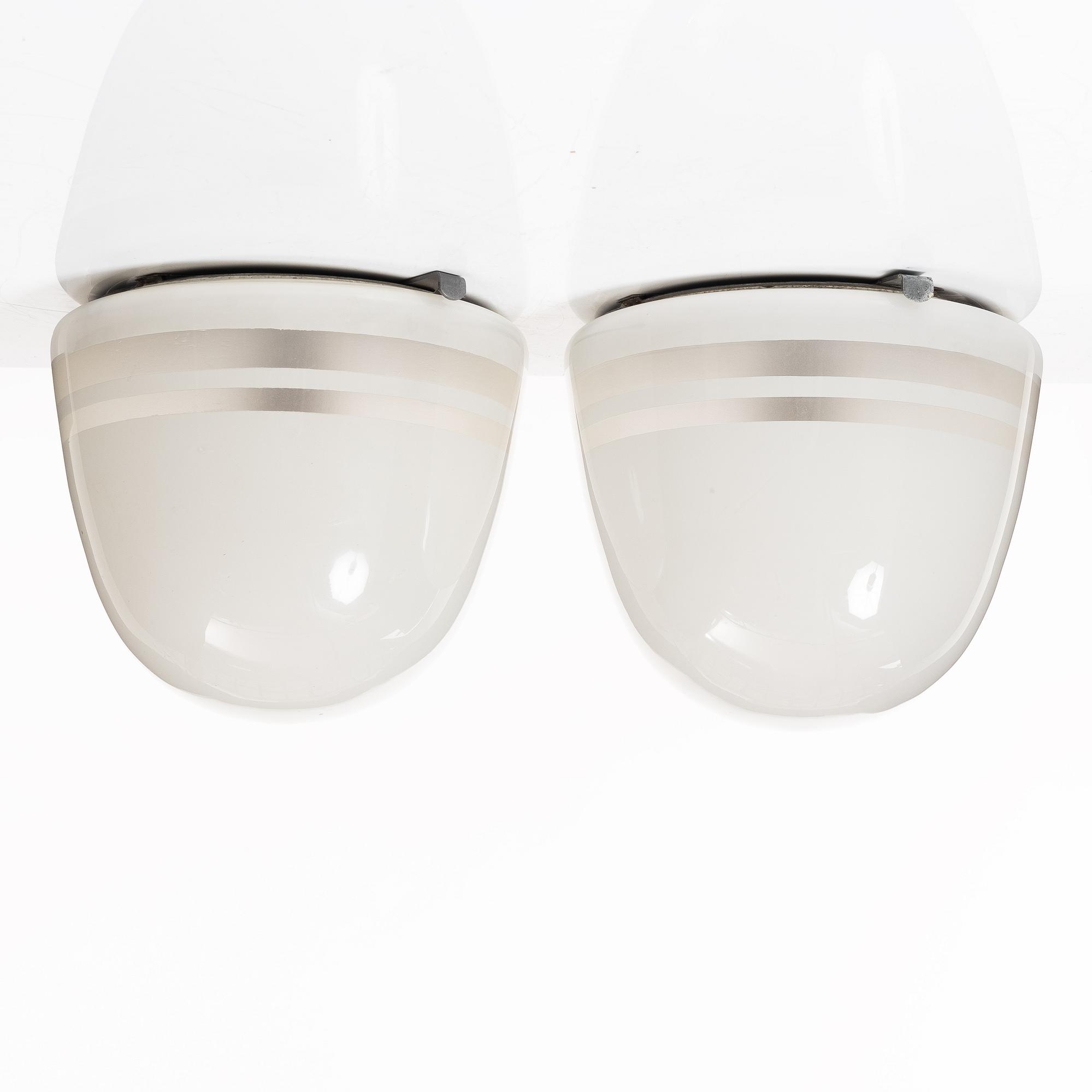 Harald Notini, a pair of ceiling lamps, variant of model "10148", Arvid Böhlmarks Lampfabrik, Stockholm, 1930s.