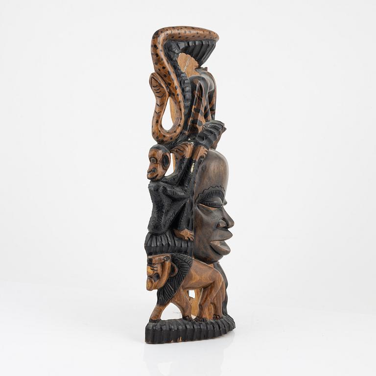 A wooden mask, Gambia, 21st Century.