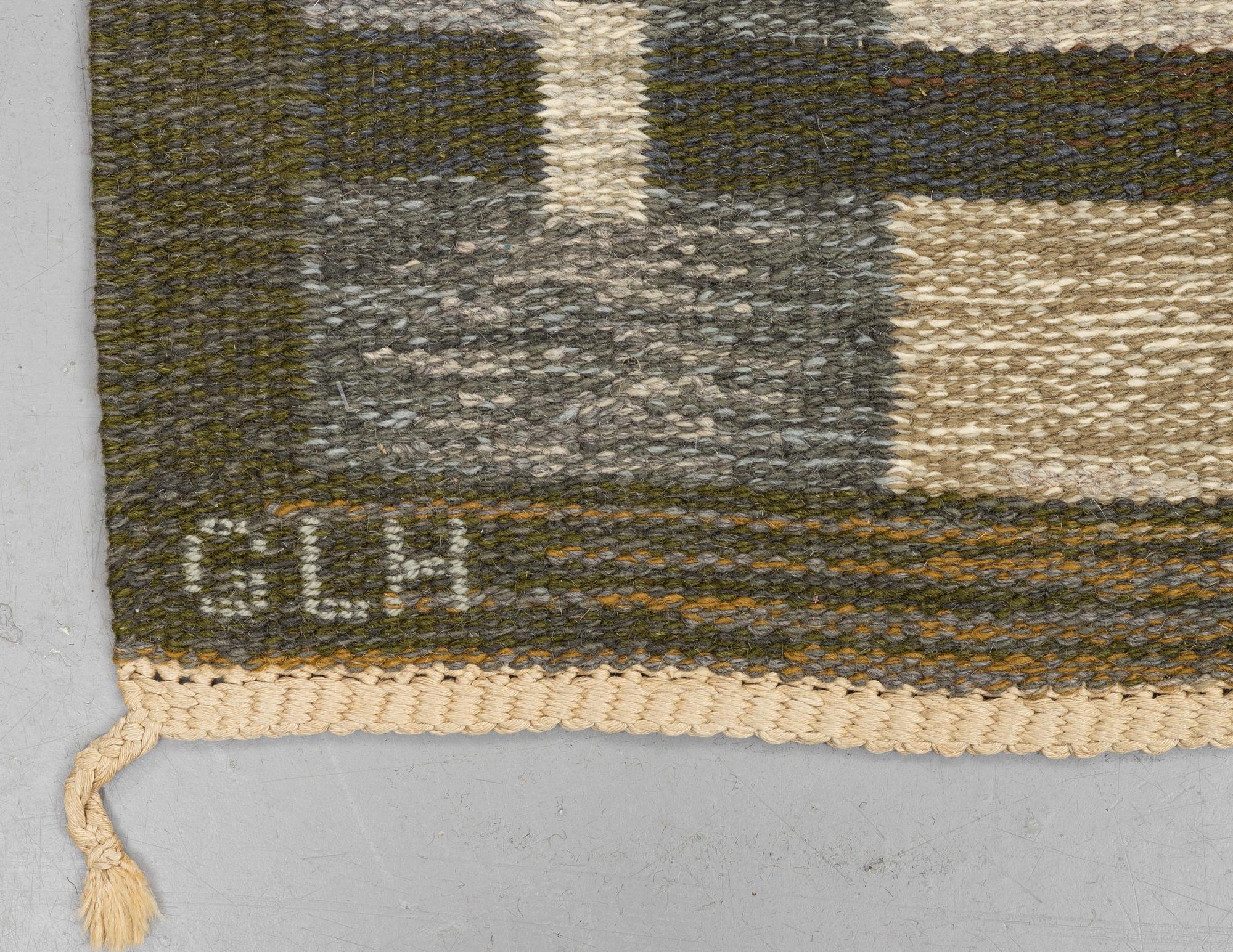 Margareta Grandin-Nettles, a carpet, flat weave, ca 249 x 167 cm, signed GLH MG.