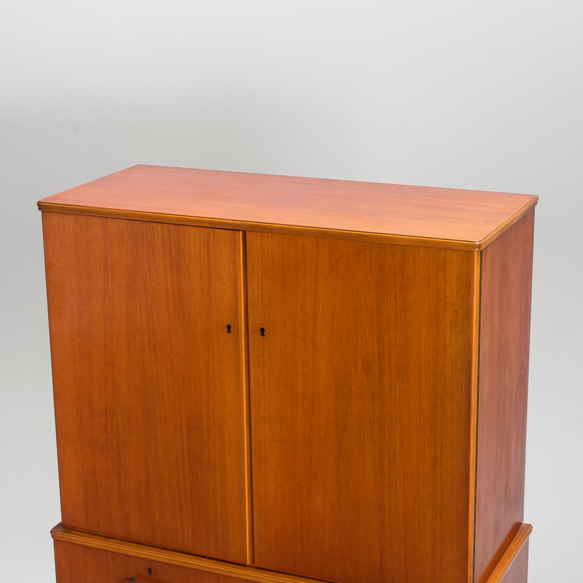 A 1950/60s mahogany veneered cabinet.
