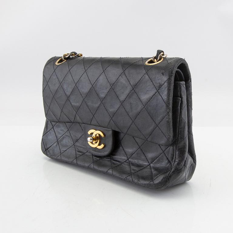 Chanel, a "Double Flap Bag".