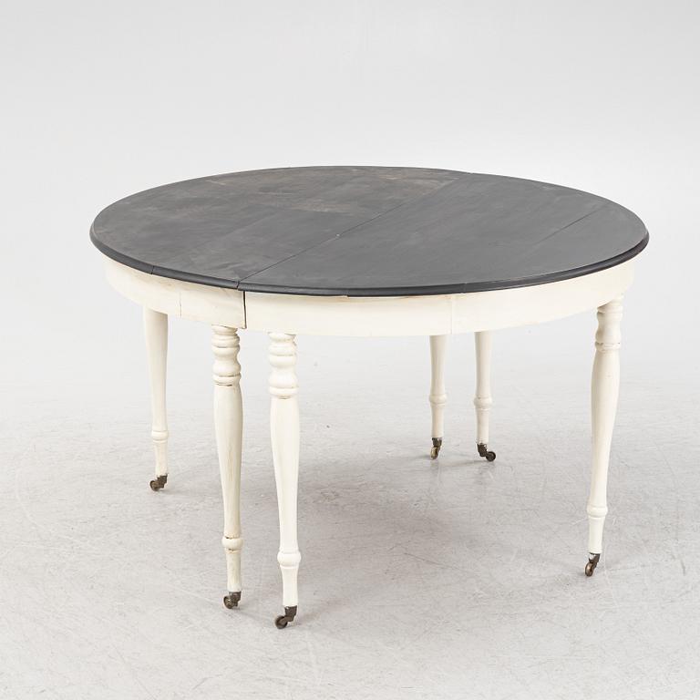 A painted dining table, late 19th Century.