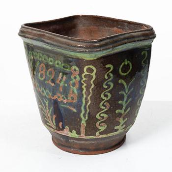 Stoneware planter and stand, dated 1824.