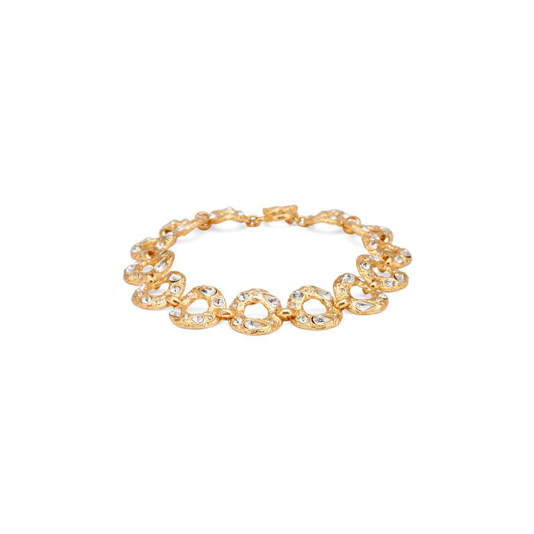 EDOUARD RAMBAUD, a gold colored metal necklace with glasestones cut in various chapes.