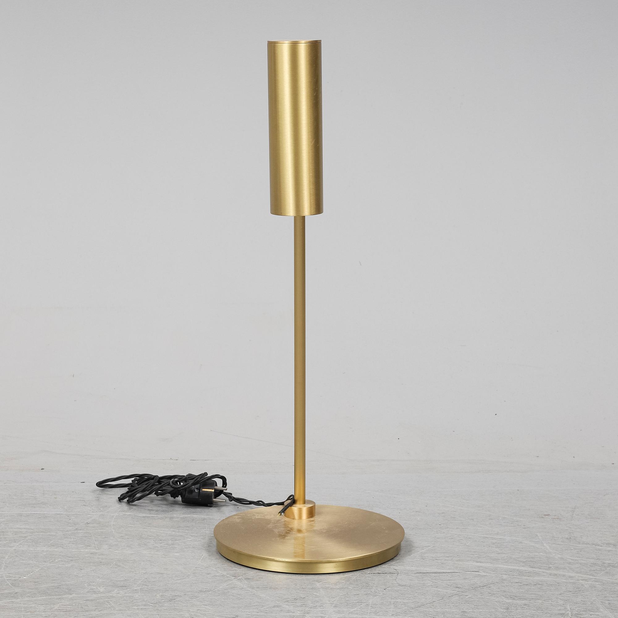 A 'Heron' brass table light by Michael Verheyden for CTO lighting.