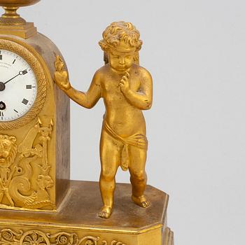 A German Empire mantel clock, early 19th century.