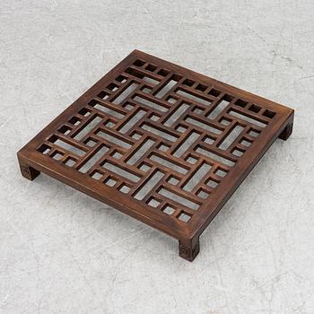 A Chinese hardwood folding chair, 20th century.