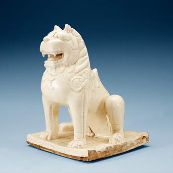 1748. A large white glazed figure of a 'Buddhistic Lion', Qing dynasty, presumably Kangxi (1662-1722).